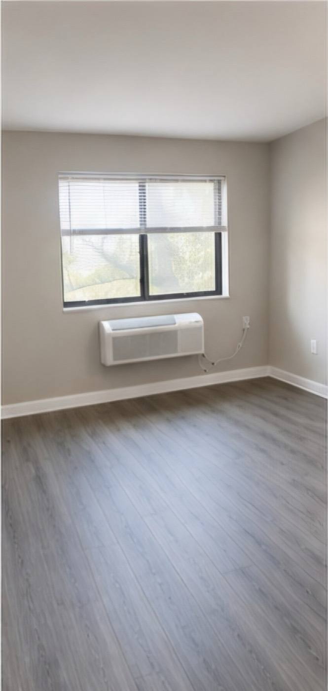 A renovated bedroom with a large window